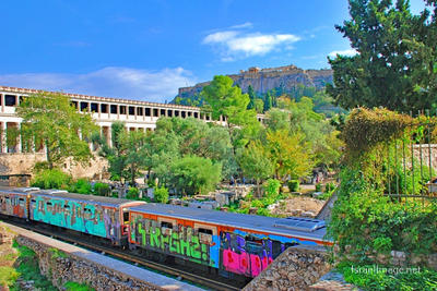 Greece Athens Metro Running Along Agora With The Acropolis In The Background 0001